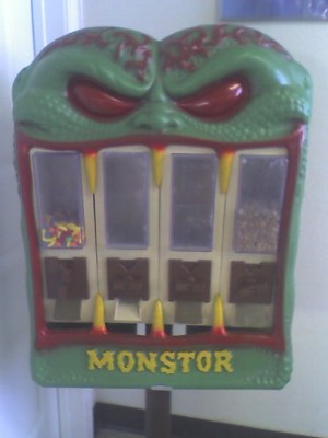 Misspelled (decrepit) candy vending machine